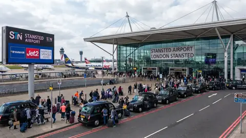 Minicab outside the Stansted Airport terminal building
